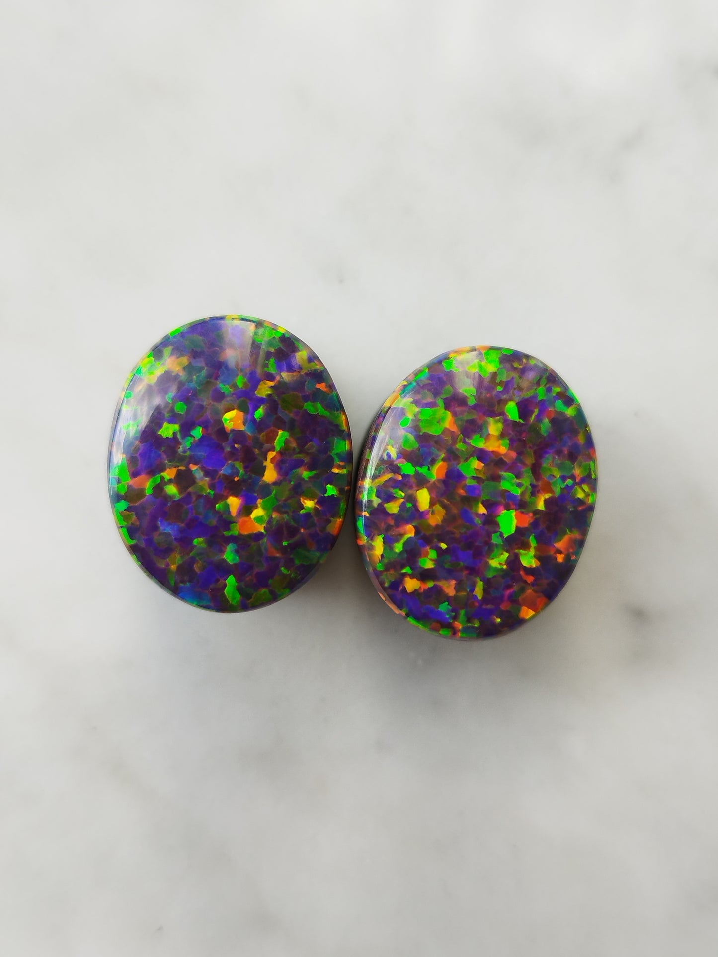 5/8" Oval Synthetic Opal And Obsidian Plugs