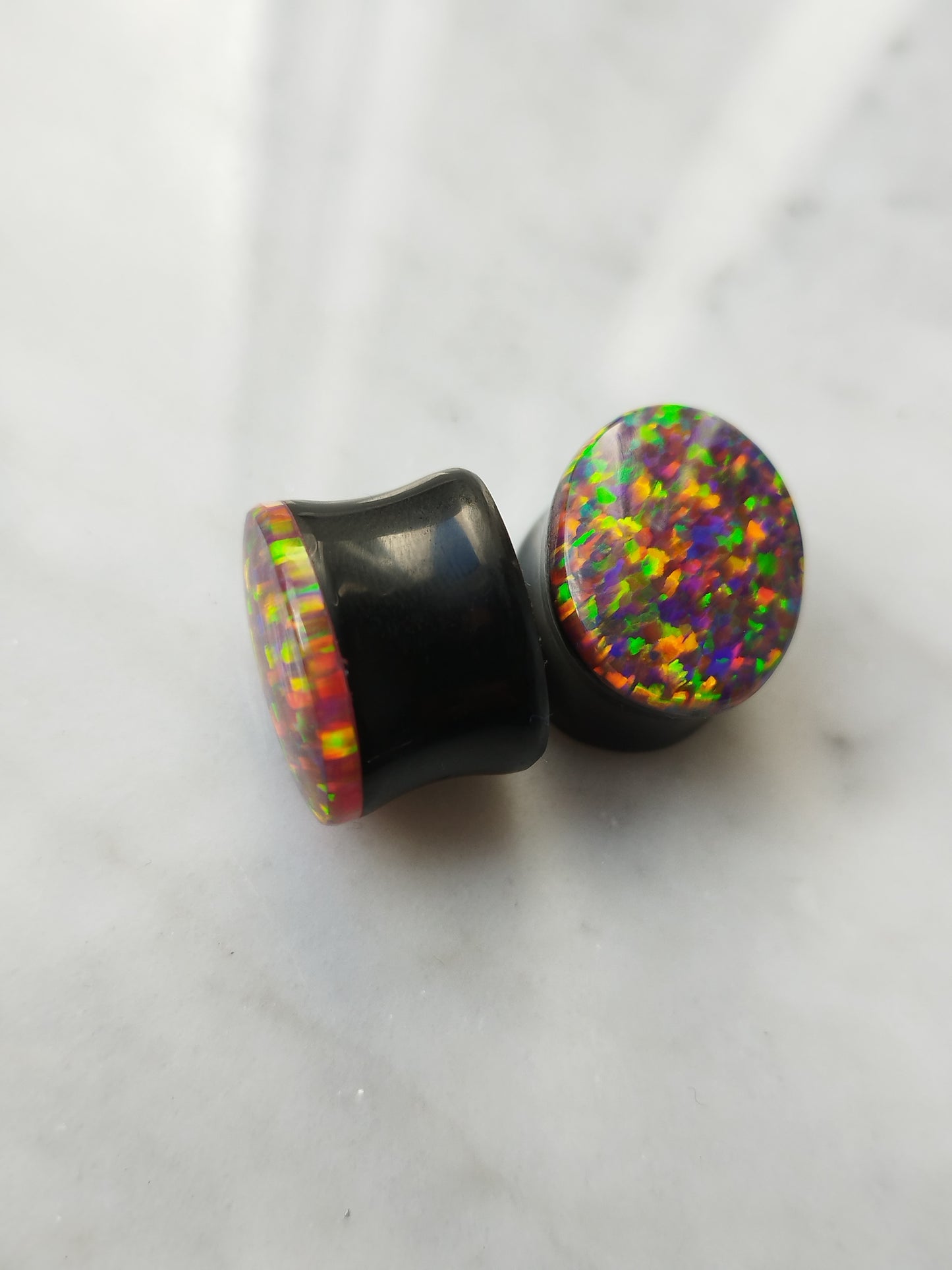 5/8" Oval Synthetic Opal And Obsidian Plugs