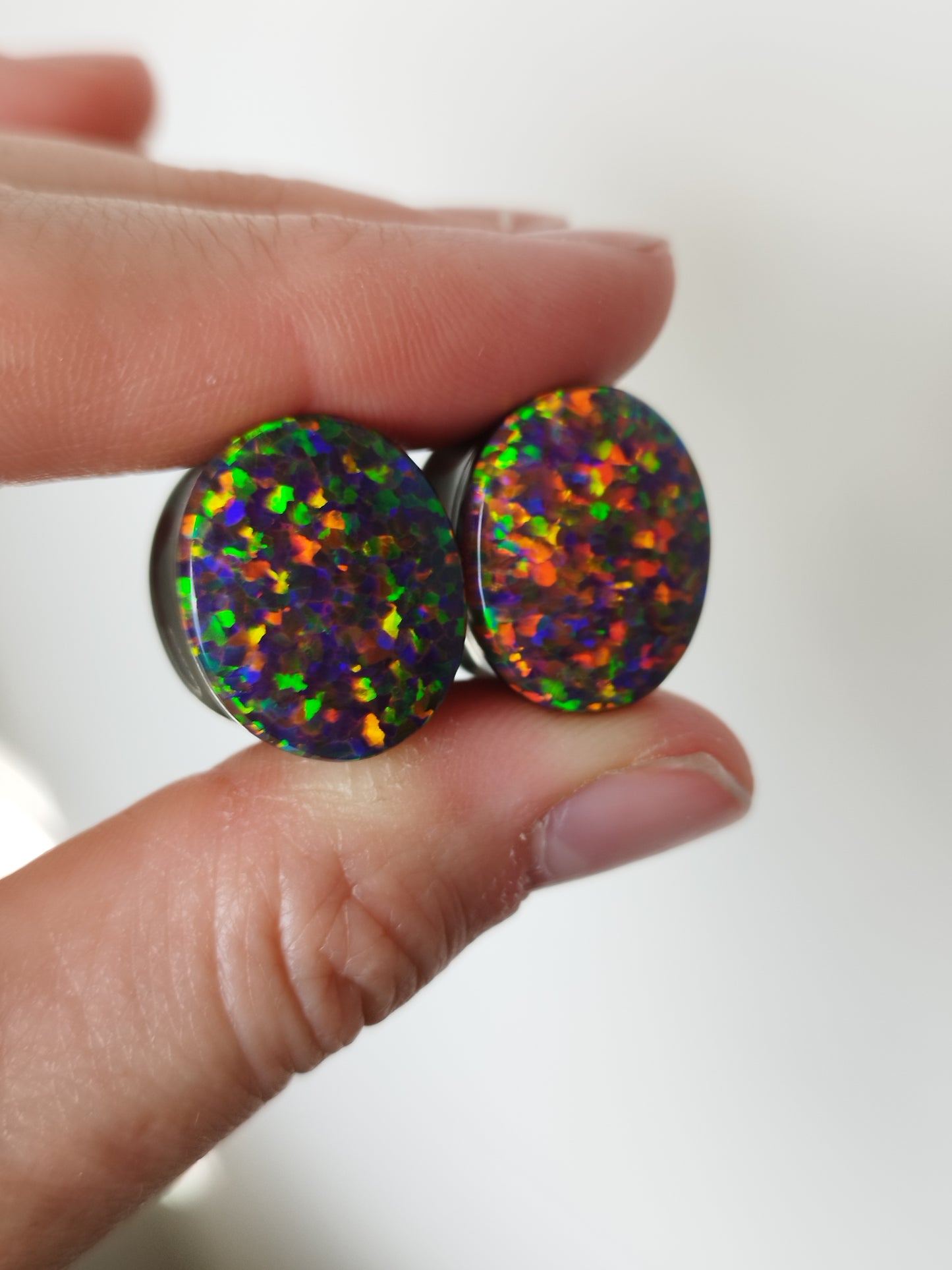 5/8" Oval Synthetic Opal And Obsidian Plugs